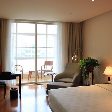 Green Park Hotel Tianjin Binhai  Номер фото